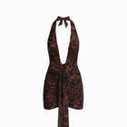 Mini abito leopardato con profondo scollo e drappeggi in mesh