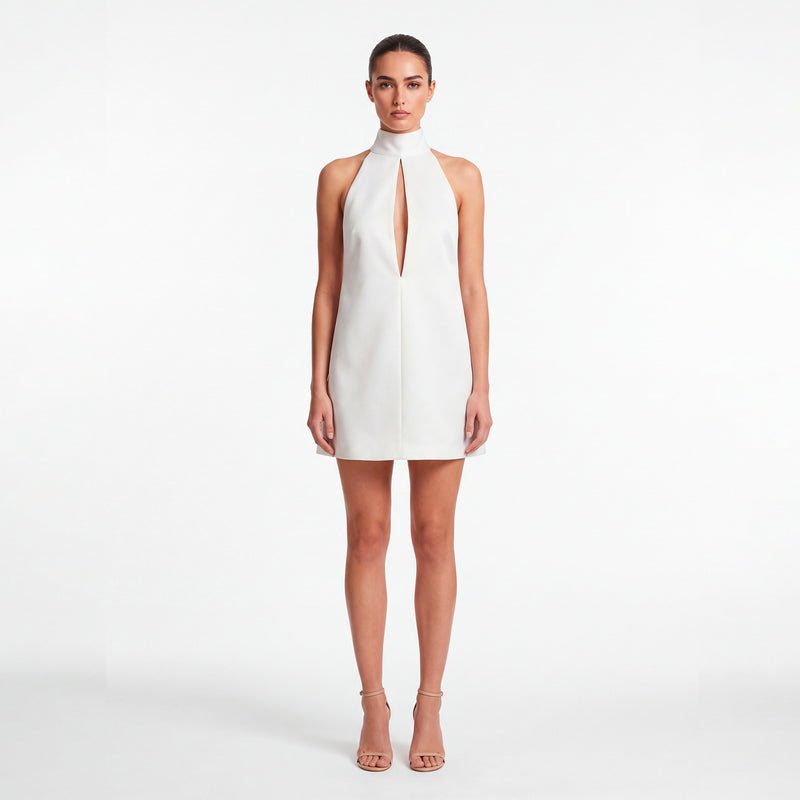 Mini abito bianco in cotone con scollo a goccia